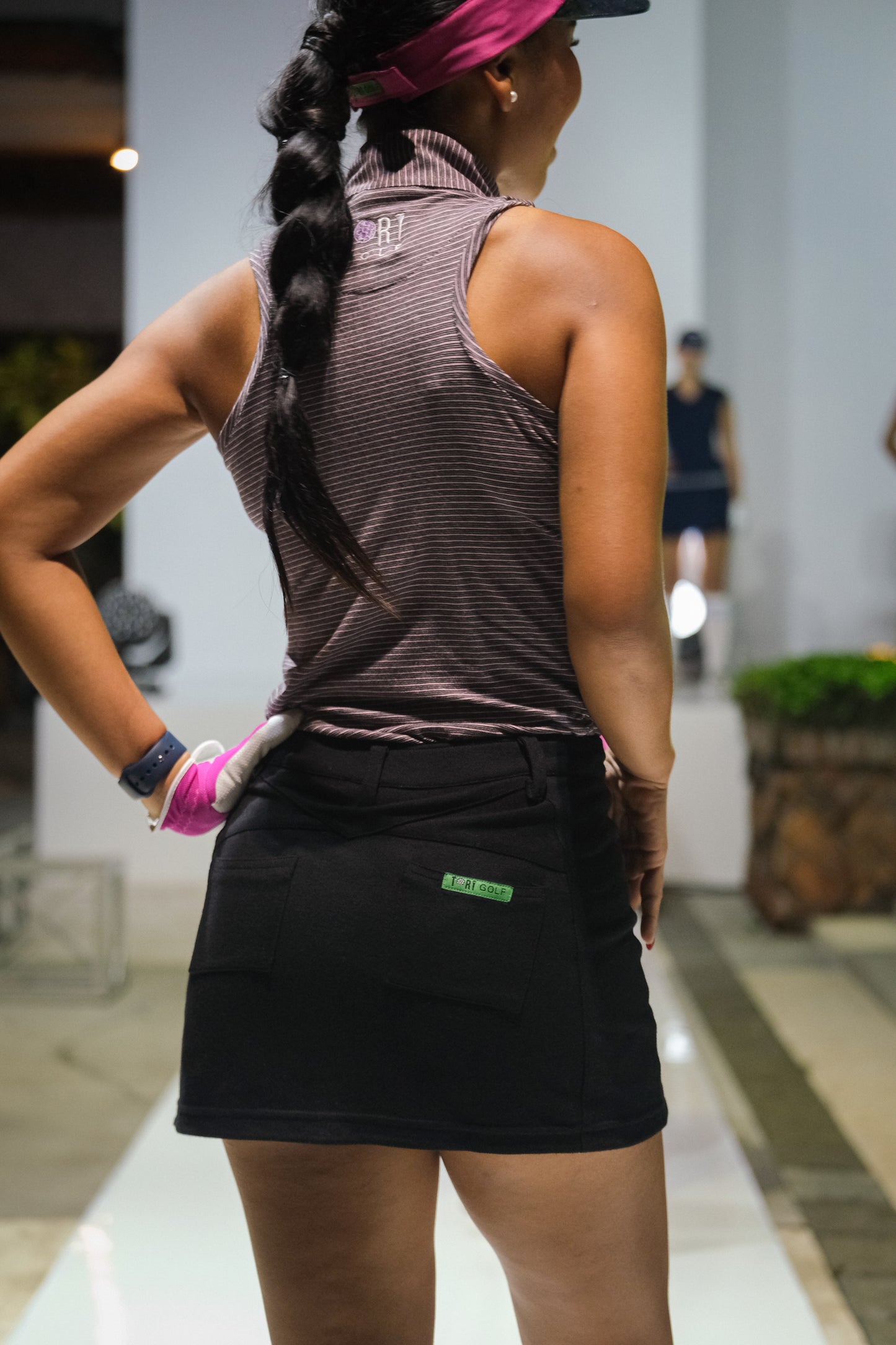 LT-127 || Ladies top nude pink with black multiple horizontal stripes sleeveless and vee neck fastened