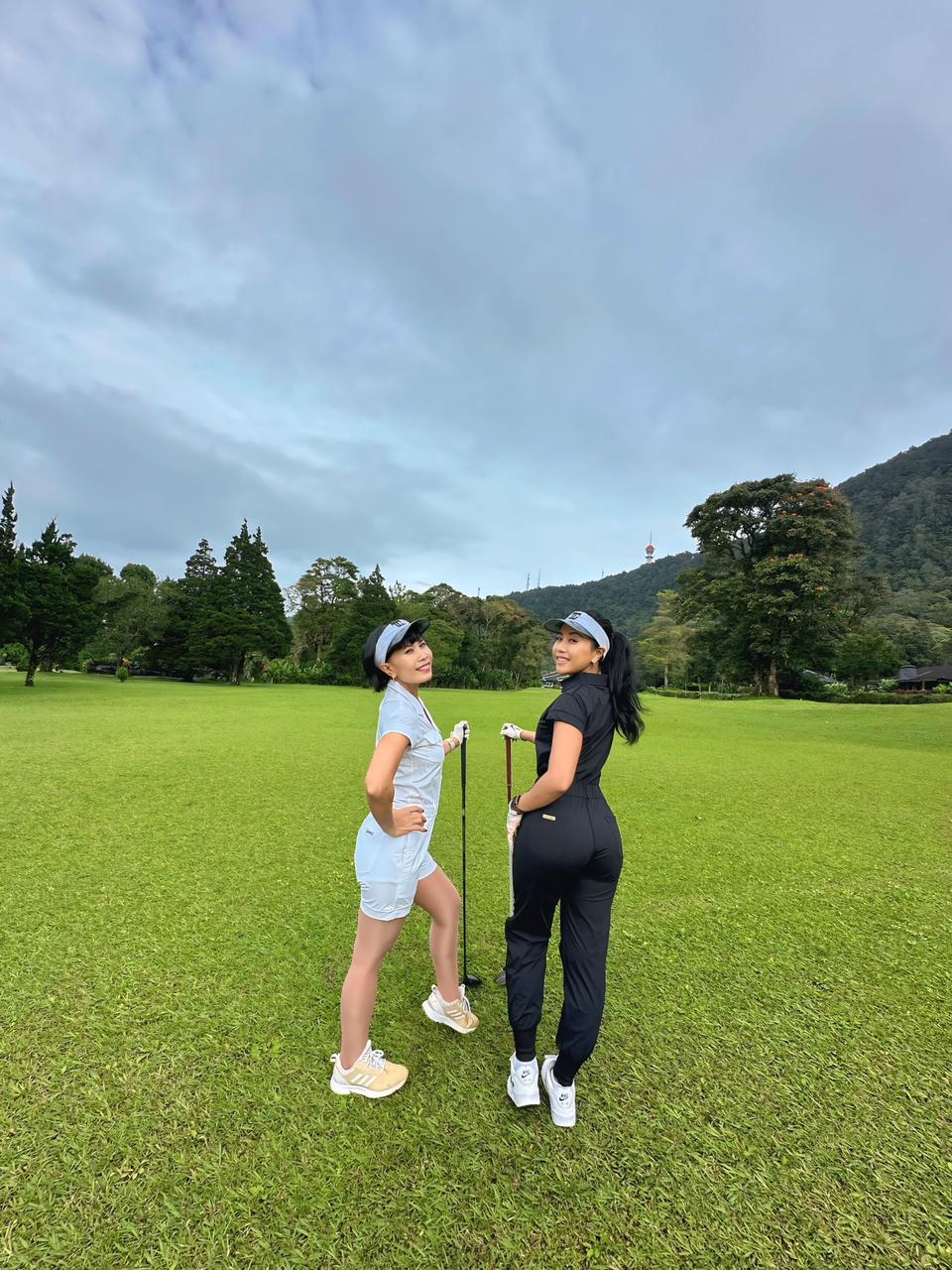 LJS-002 || Ladies Golf Jumpsuit Short Sleeve with Collar Neck Black Color and Long Pants, with a Zipper in Front and 2 Pockets on The Right and Left of The Chest and Elastic Band on The Waist