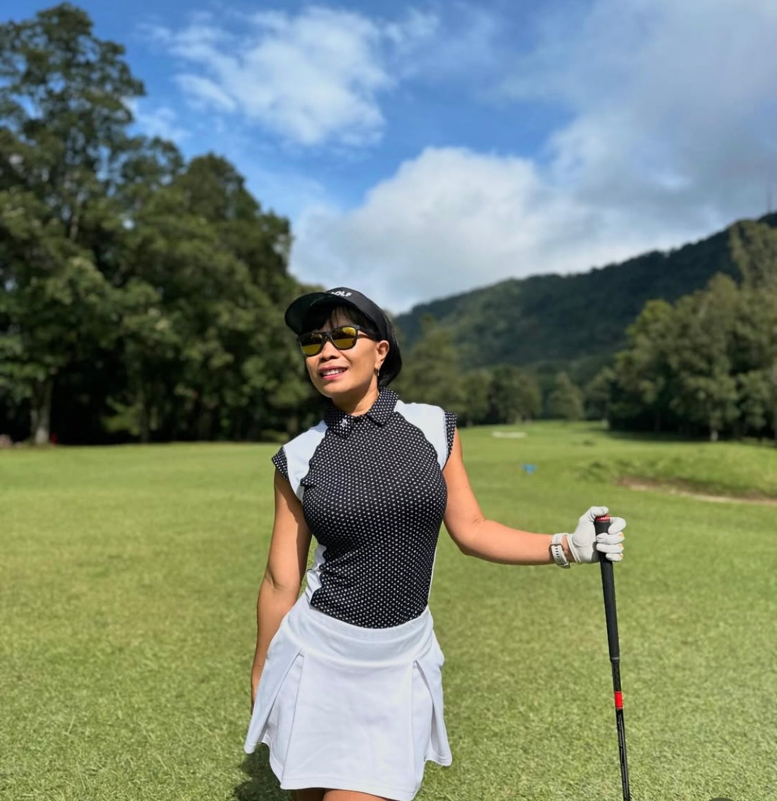 LT-125A || Ladies top black with small star motif short sleeve w white shoulder saddle on front and back panels - rear zip peter pan collar
