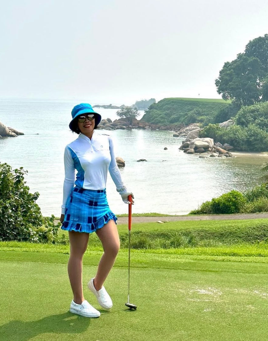 LGS-020D || Golf Set – Top White Long Sleeve Mandarin / Vee Neck Zip Fastened Mid Blue Tartan Breathable Side & Shoulder Panels with Mid and Dark Blue Tartan Skirt Button Waist Fastening Two Front & One Rear Pockets Contoured Pleated Short Hem