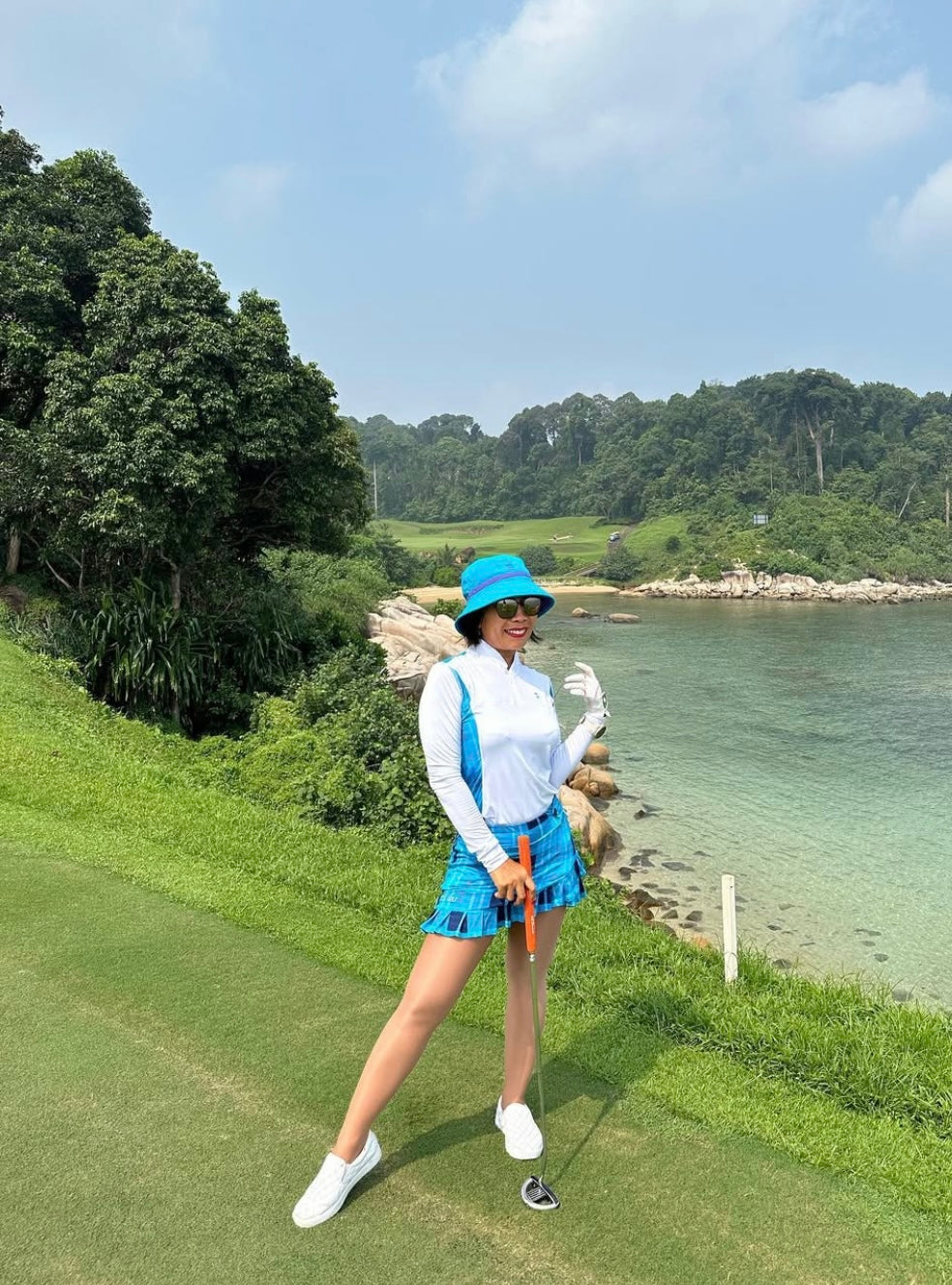 LGS-020D || Golf Set – Top White Long Sleeve Mandarin / Vee Neck Zip Fastened Mid Blue Tartan Breathable Side & Shoulder Panels with Mid and Dark Blue Tartan Skirt Button Waist Fastening Two Front & One Rear Pockets Contoured Pleated Short Hem