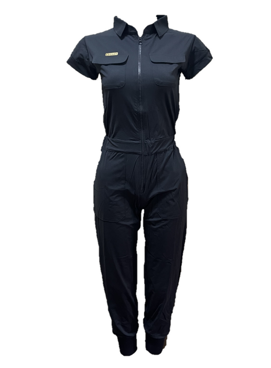 LJS-002 || Ladies Golf Jumpsuit Short Sleeve with Collar Neck Black Color and Long Pants, with a Zipper in Front and 2 Pockets on The Right and Left of The Chest and Elastic Band on The Waist