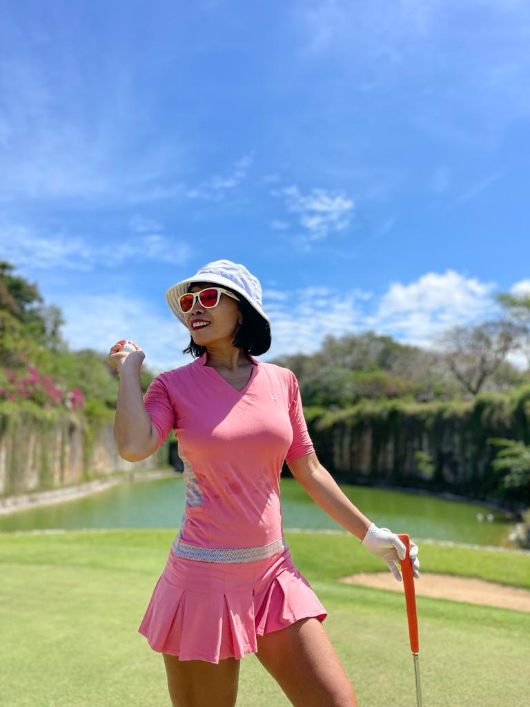 GD-017 || Golf Dress Salmon Pink Open V Neck Mandarin Collar Pleated Swing Hem with Orange Blue and White Fine Herringbone Pattern Underarm and Above Hemline Trim, 2 Side Pockets