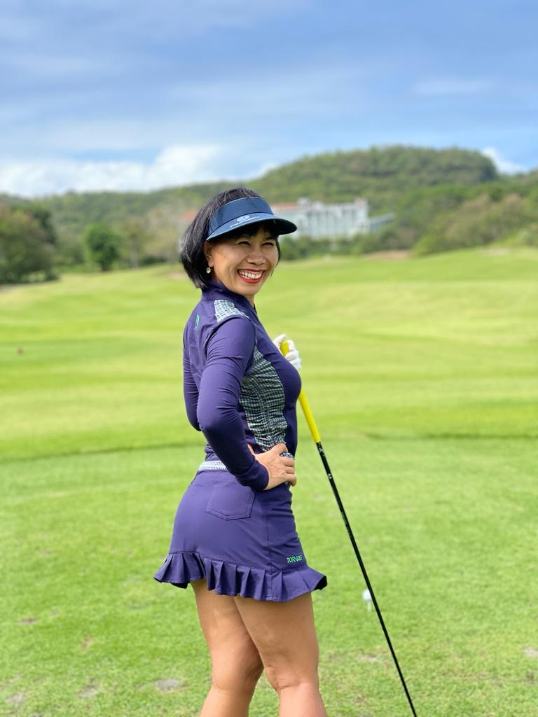 LGS-016 || Golf Set (Top & Skirt) – Top Navy Long Sleeve Mandarin / V Neck Zip Fastened Navy with Green and Blue Modern Batik Breathable Side & Shoulder Panels with Navy Skirt Button Waist Fastening Two Front & One Rear Pockets Contoured Pleated Short Hem