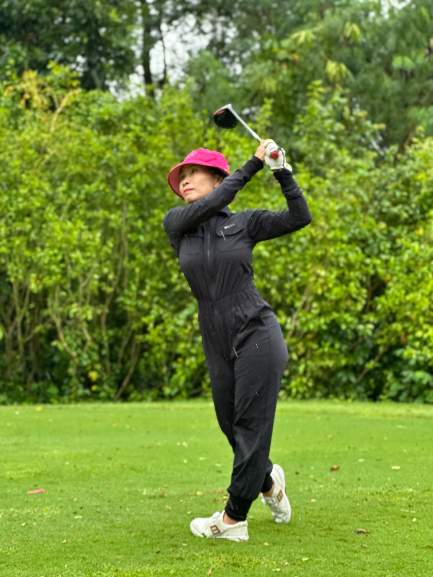 LJS-001 || Ladies Golf Jumpsuit Long Sleeve with Collar Neck Black Color and Long Pants, with a Zipper in Front and 2 Pockets on The Right and Left of The Chest and Elastic Band on The Waist