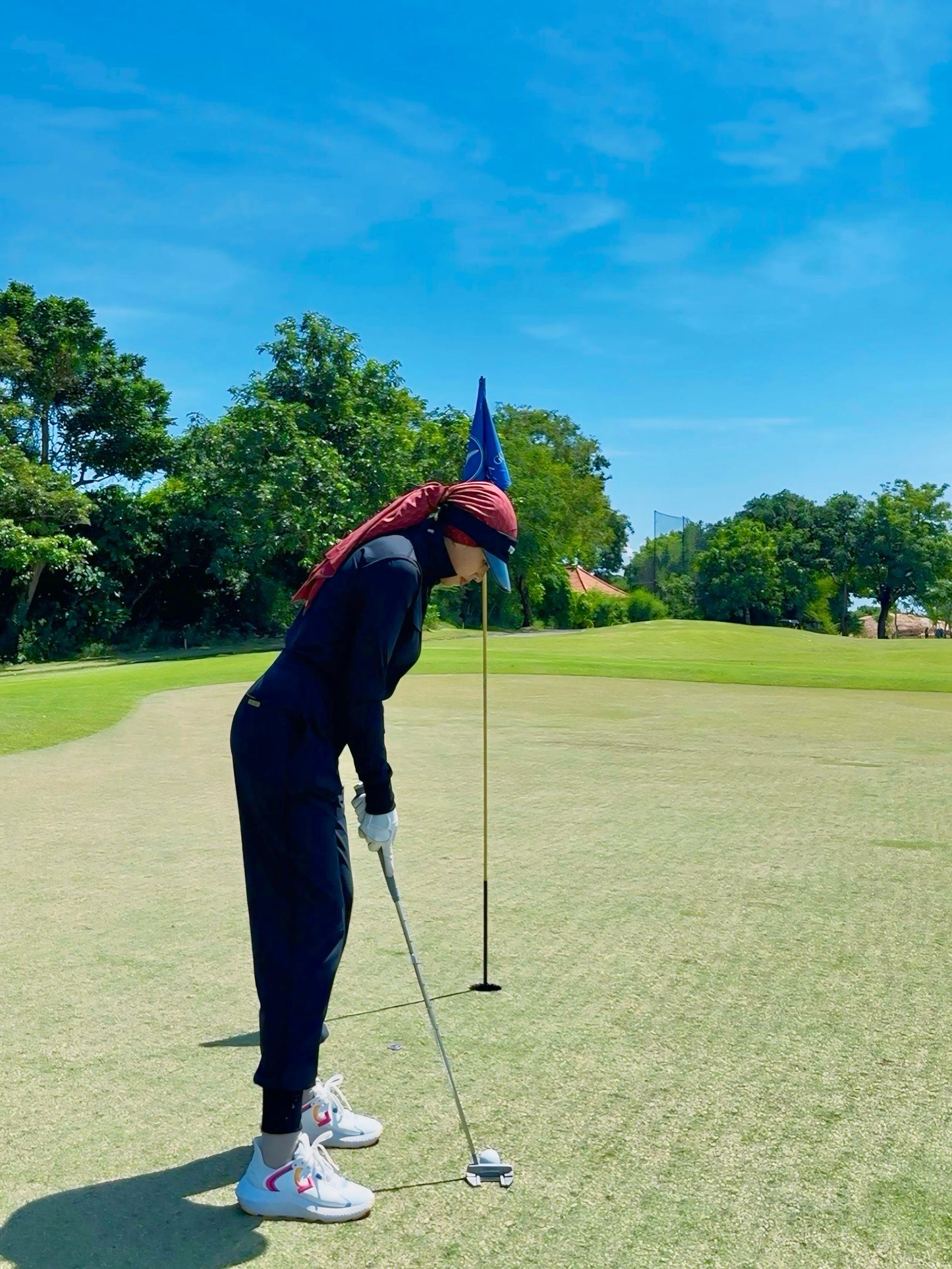 LJS-001 || Ladies Golf Jumpsuit Long Sleeve with Collar Neck Black Color and Long Pants, with a Zipper in Front and 2 Pockets on The Right and Left of The Chest and Elastic Band on The Waist