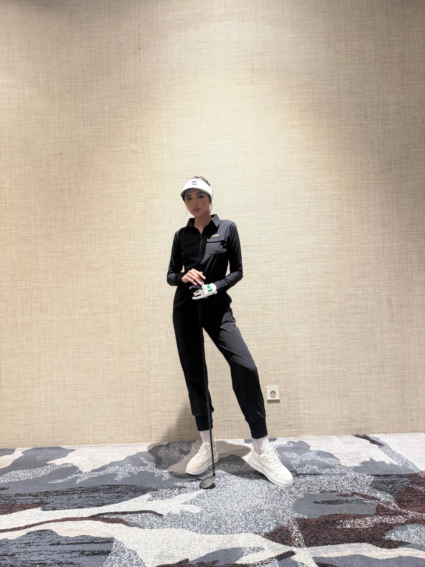 LJS-001 || Ladies Golf Jumpsuit Long Sleeve with Collar Neck Black Color and Long Pants, with a Zipper in Front and 2 Pockets on The Right and Left of The Chest and Elastic Band on The Waist