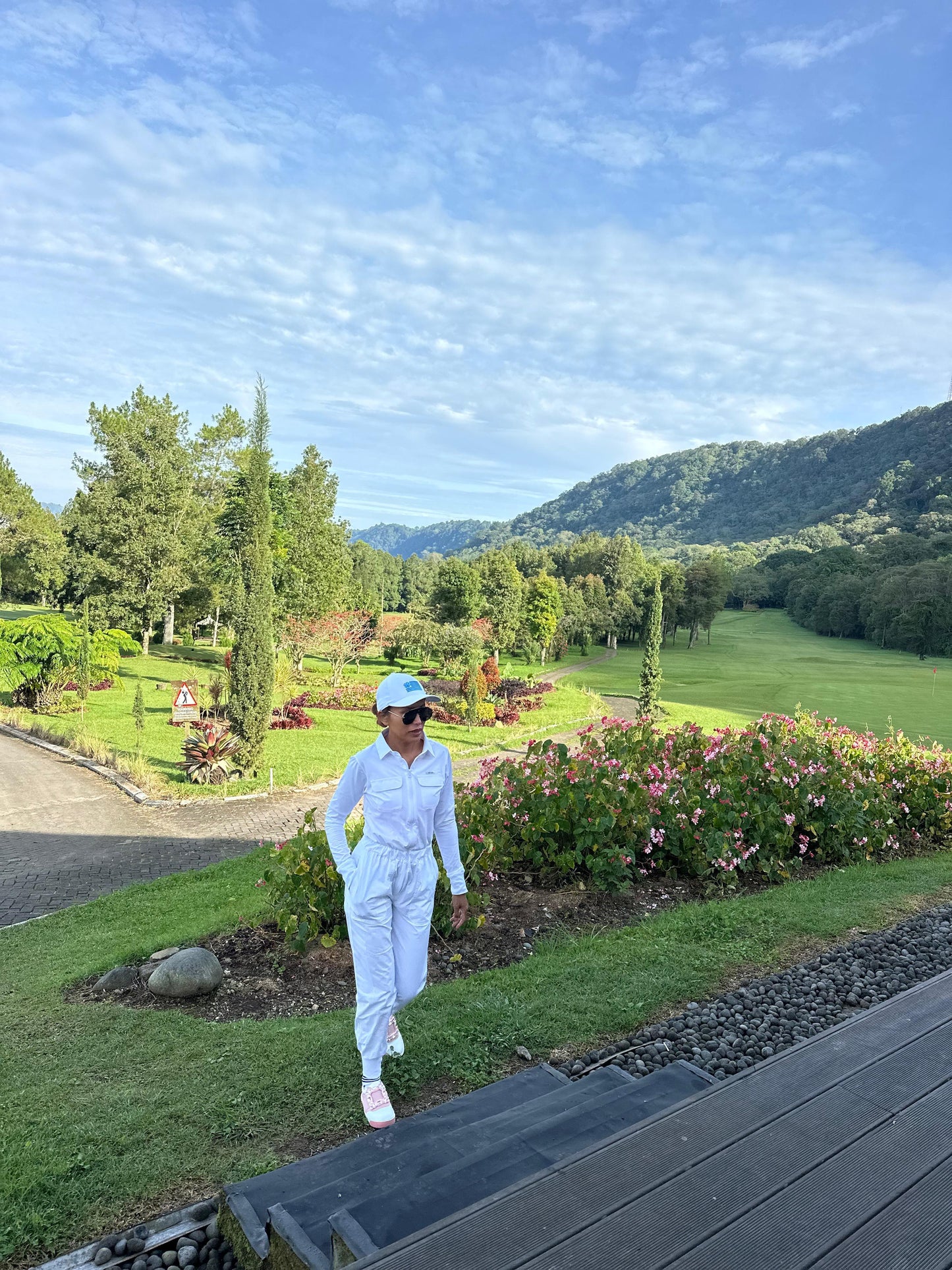 LJS-001A || Ladies Golf Jumpsuit Long Sleeve with Collar Neck White Color and Long Pants, with a Zipper in Front and 2 Pockets on The Right and Left of The Chest and Elastic Band on The Waist.