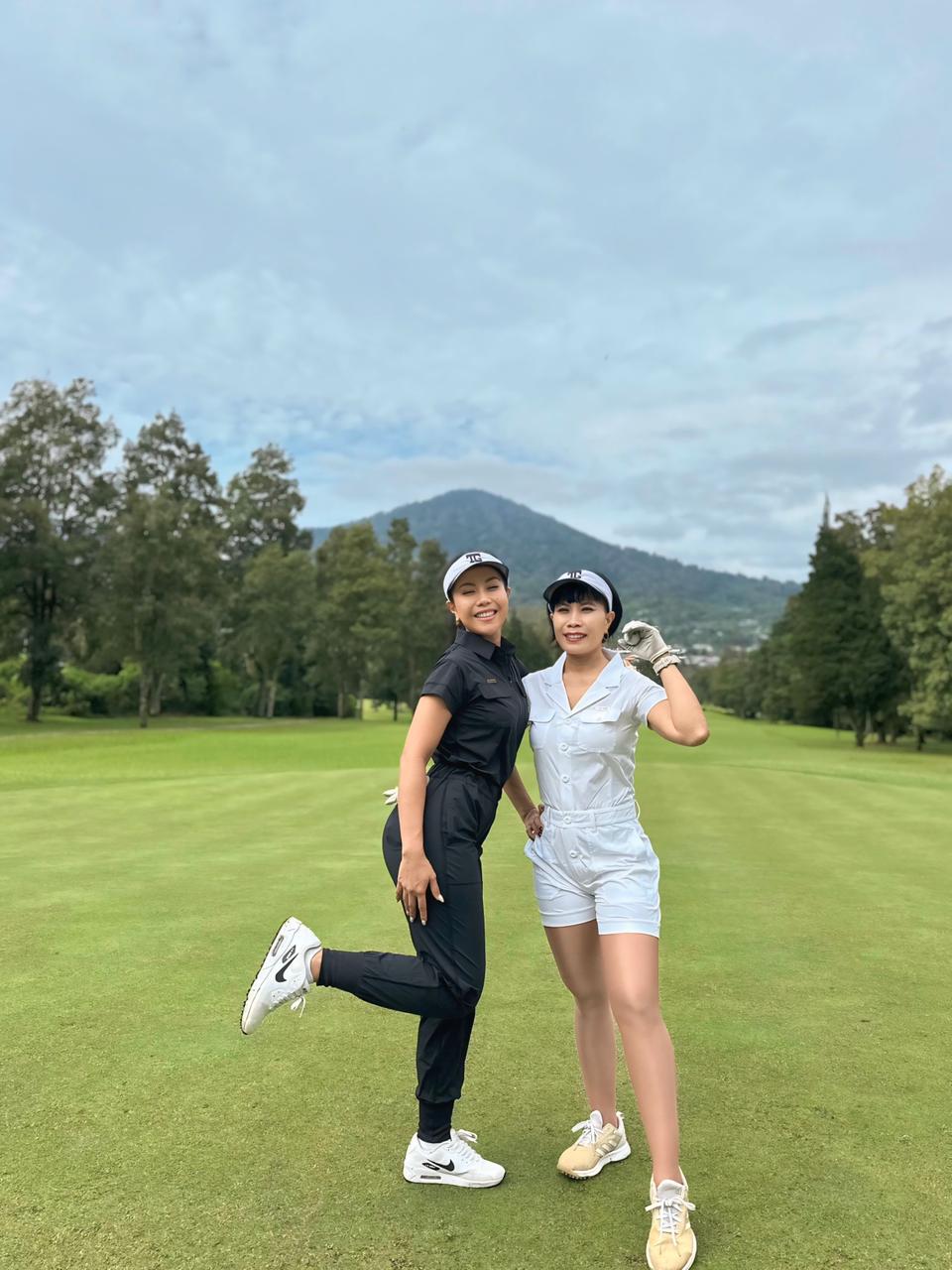 LJS-003A || Ladies Golf Jumpsuit White Color with Shawl Sollar, Short Sleeves with Shorts and Buttons in Front and 2 Pockets on the Right and Left Sides of the Front Chest