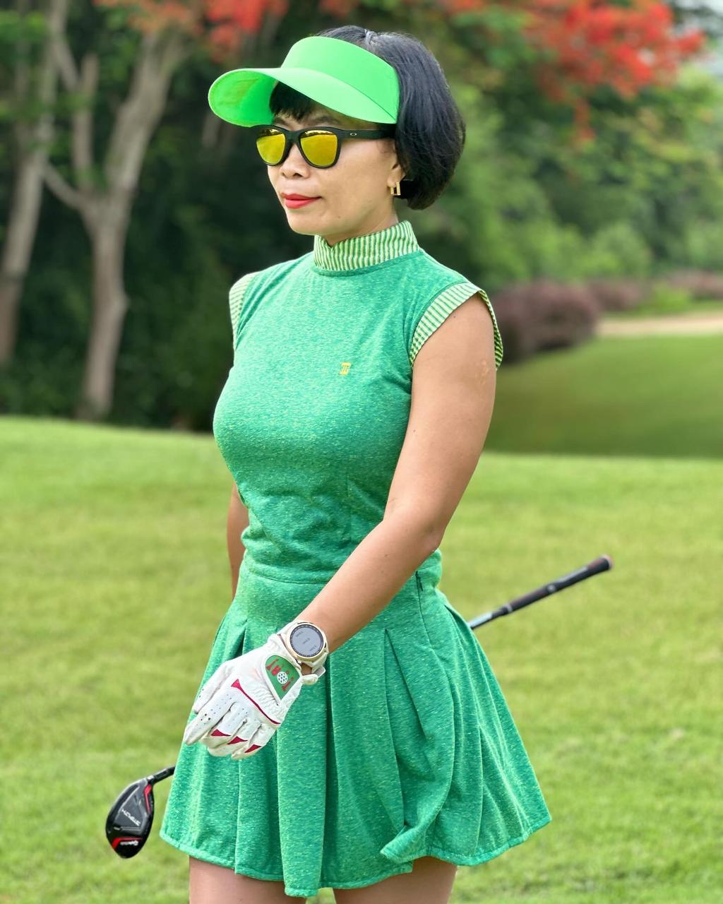 GD-028C || Golf Dress Green with Yellow Fleck Short Sleeve Mandarin Neck with Fleck Green and White-Collar Diagonal Stripes Trim 1 Side Pockets 1/3 Lower Pleated / Swing Section