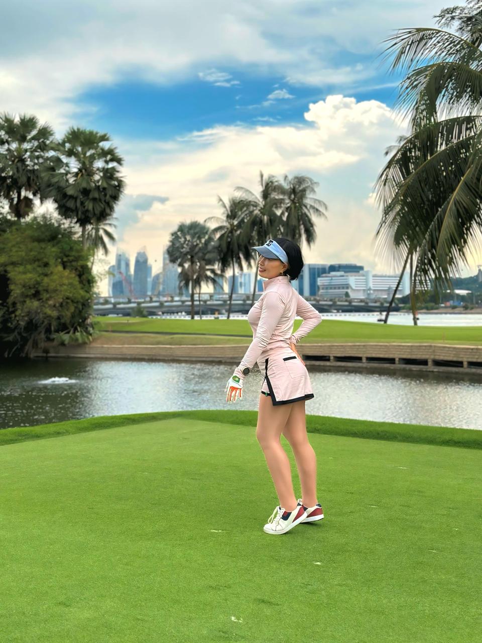 LGS-023 || Golf Set - Top Long Sleeve Mock Neck with Zipper Pink Nude Color. Pink Nude Skirt with a Black Combination on The Edges and an Inverted V-Slit on The Left Side.